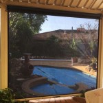 looking through blinds to pool