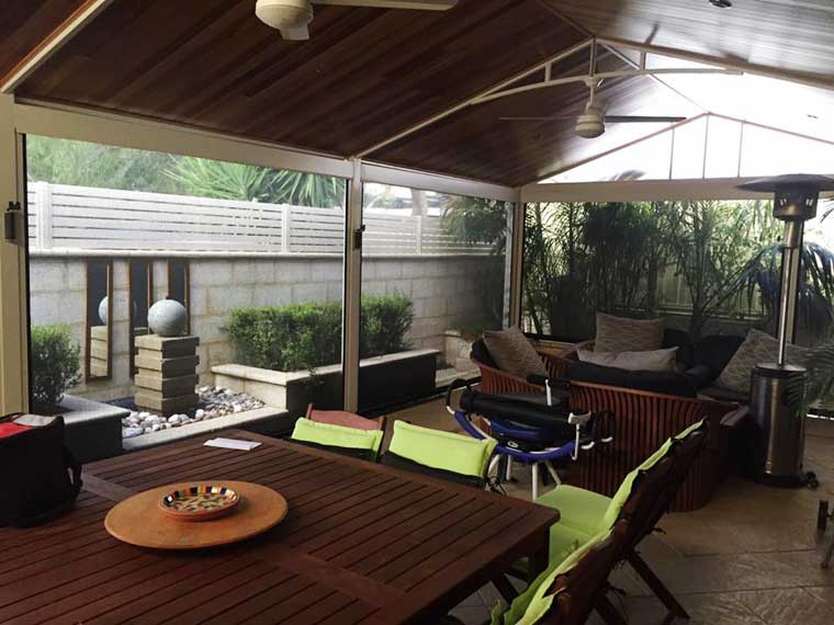 the outdoor blinds create a whole new weather protected living space